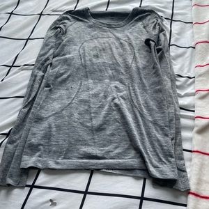 Worn once or twice, soft, inside tag ripped off but I still have it